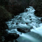 Long Exposure river + tail light